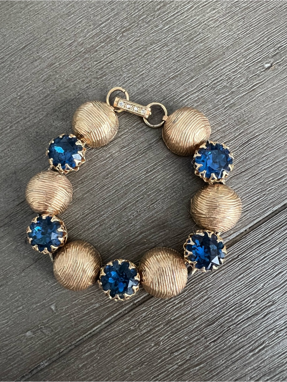 Gold-Tone Bracelet with Deep Blue Crystal Stations